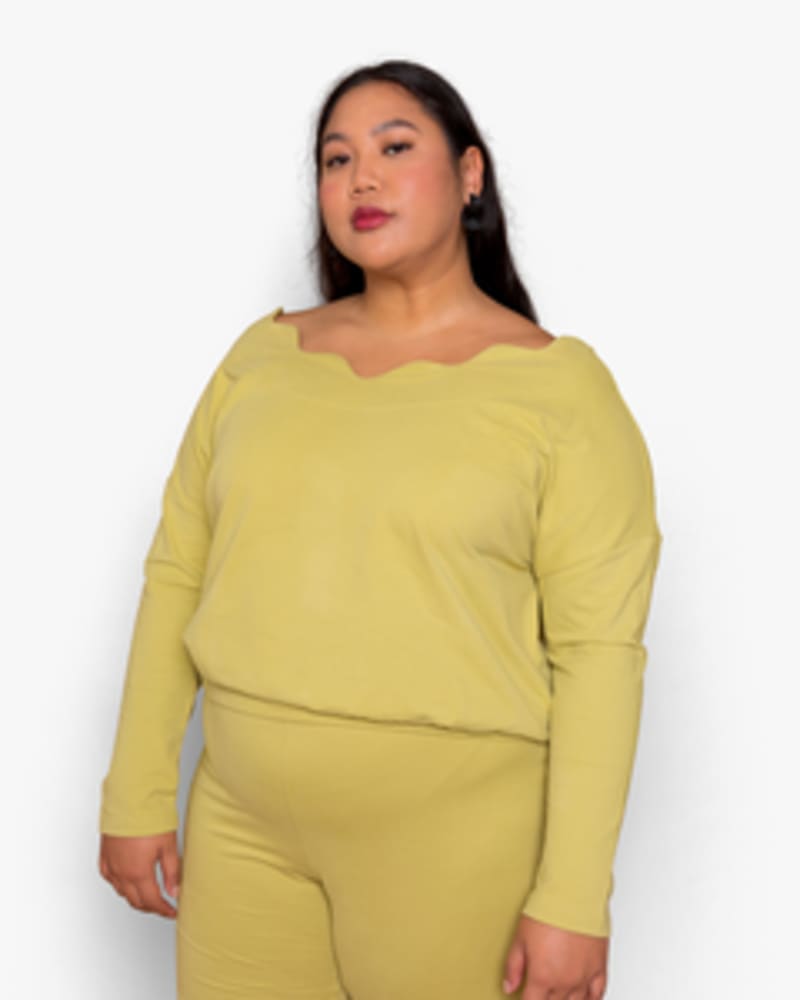 Front of a model wearing a size XL Cathy Pullover in Pear by Lovefool. | dia_product_style_image_id:249600